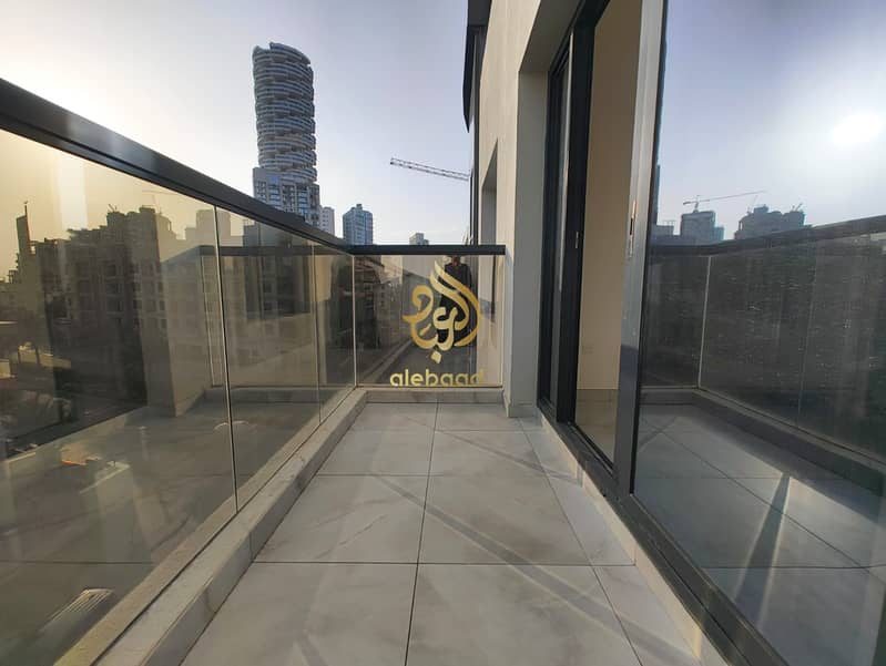 2 Bedroom Apartment | White Rose Building JVC | Balcony & City View - Image 14