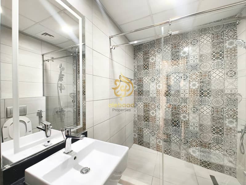 2 Bedroom Apartment | White Rose Building JVC | Balcony & City View - Image 16