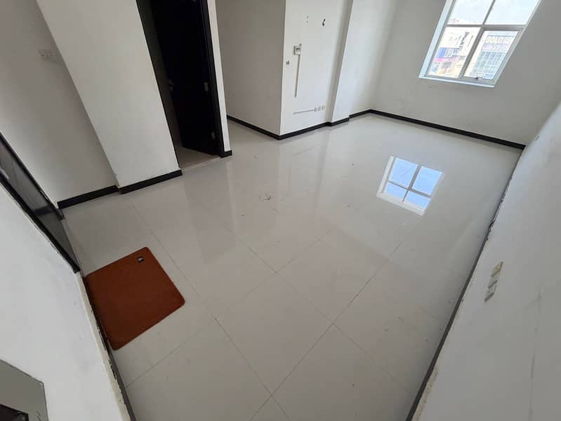 For annual rent in Al Rawda, Ajman, we offer beautiful apartments with high specifications: a two-bedroom apartment with a living room, two bathrooms,