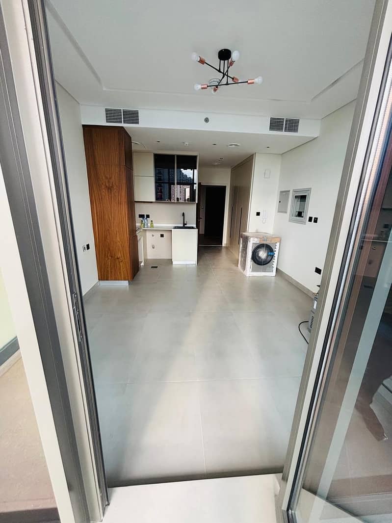 Brand New Studio | Next To Metro | Al Furjan | Balcony | Community & Pool View - Image 4