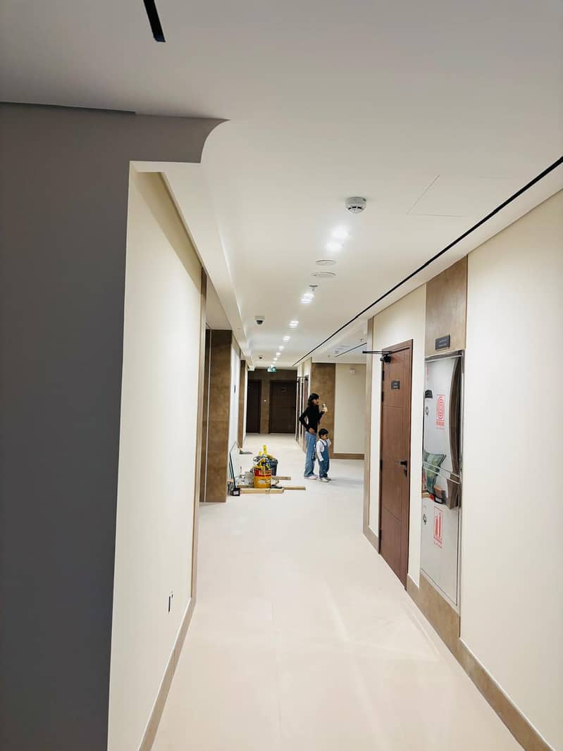 Brand New Studio | Next To Metro | Al Furjan | Balcony | Community & Pool View - Image 11