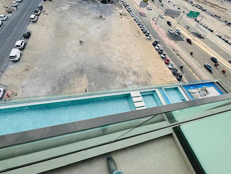 Brand New Studio | Next To Metro | Al Furjan | Balcony | Community & Pool View - Image 12