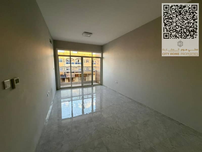 A two-bedroom apartment with living room for annual rent in Al Rawdha 3, Ajman, offering spacious areas and good finishing – second occupancy. Central