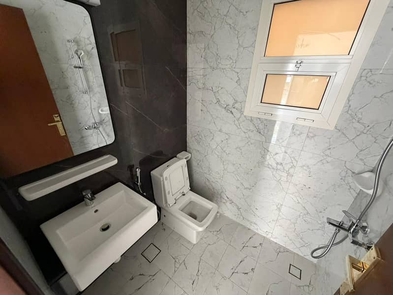 Spacious Two-Bedroom Apartment for Rent in Al Mowaihat 3 with Prime Location Near Schools and Sheikh Mohammed Bin Zayed Road