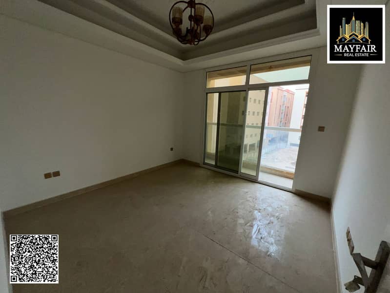 A spacious three-room apartment with a maid's room, large area, and balcony in Al Jurf 2. Excellent location and reasonable price.