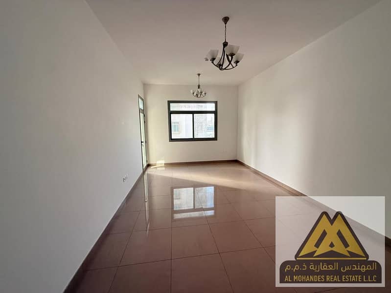 Two-Bedroom Apartment for Annual Rent in Al Rashidiya 1, Ajman – Balcony, Built-in Wardrobes, Spacious, Family Building