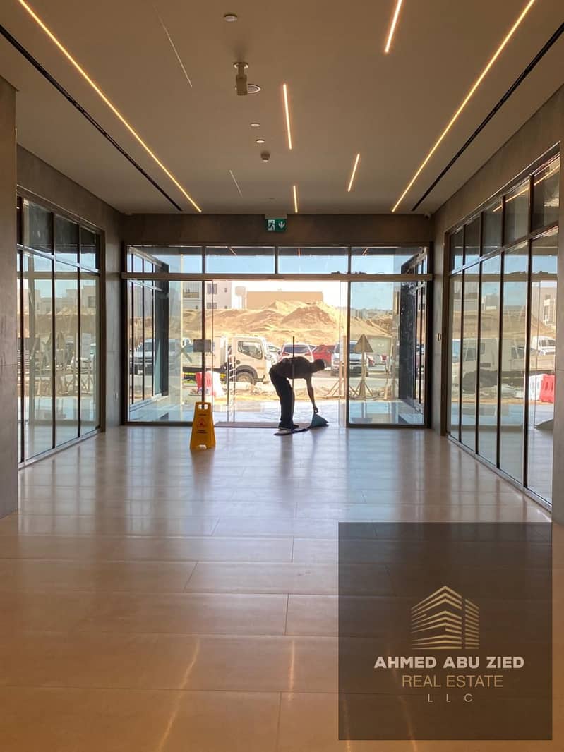 Gym | Swimming pool | Free parking | Built-in wardrobes | Two bedrooms and a living room | Three bathrooms | Central air conditioning | Balcony with a