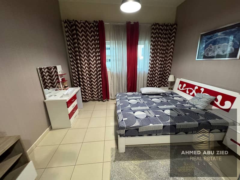 Premium fully furnished studio for annual rent in Ajman One Towers, Al Rashidiya 3. Spacious layout, equipped kitchen, central AC, pool, garden, free