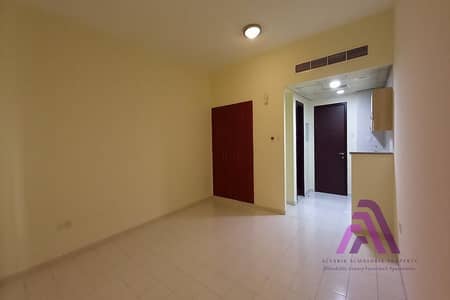 استوديو  للايجار في المدينة العالمية، دبي - 20220324_173246. jpg