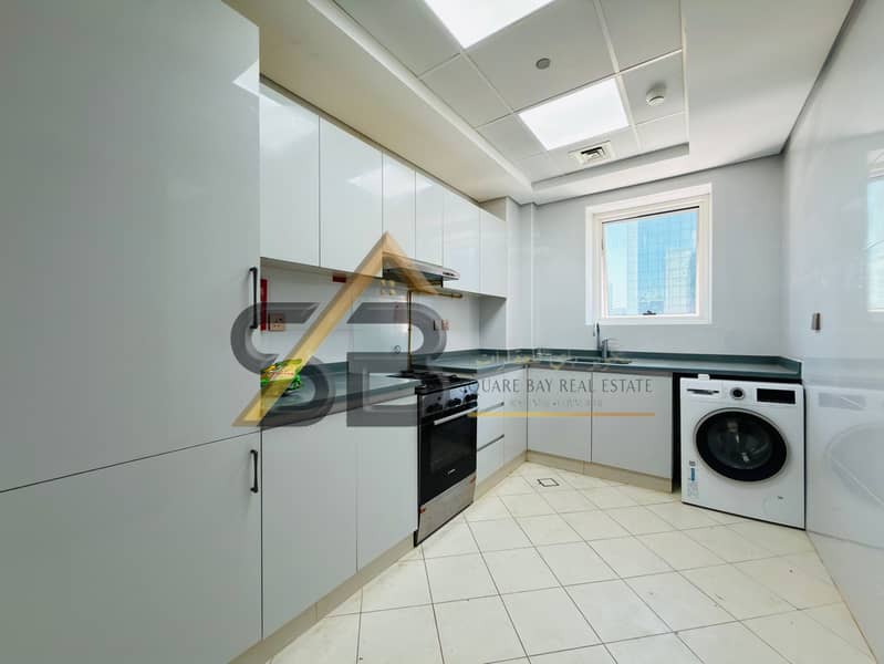 Semi-Furnished 2BHK|Fully Equipped Kitchen|Close to World trade metro|