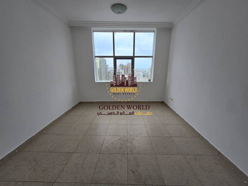 Two bedroom apartment with balcony and open view in Sharjah featuring two master rooms private parking modern layout and prime location close to all s