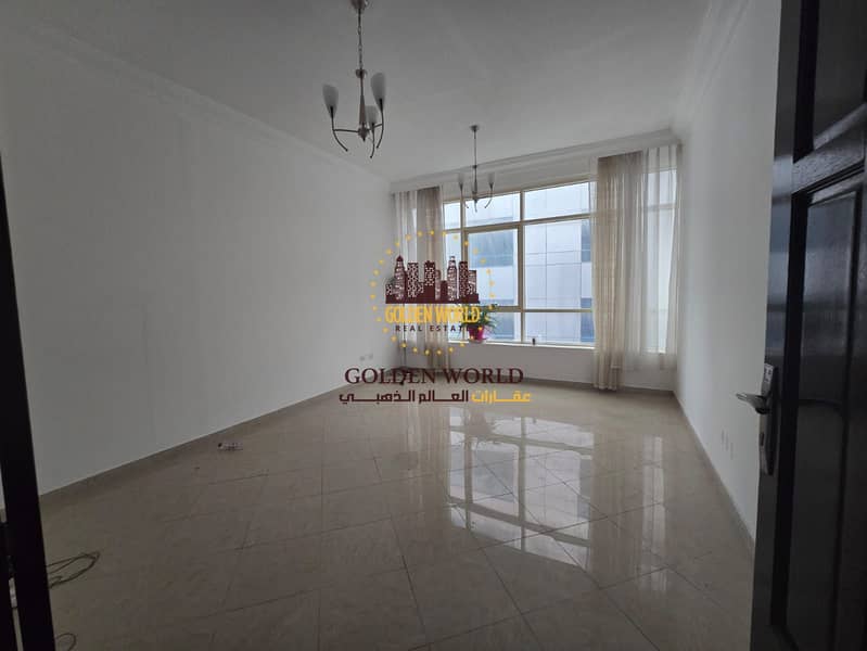 Two bedroom apartment with living room in Al Taawun Sharjah featuring practical layout two bathrooms private parking and prime location close to all s