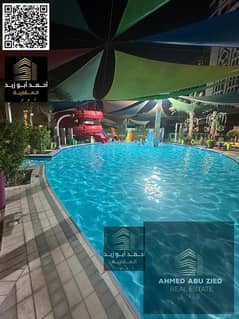 1BHK Annual Rent in Ajman – Al Rashidiya 1 | With Gym, Pool, Aqua Park & Parking | 2 Bathrooms & Balcony | Includes Home Appliances