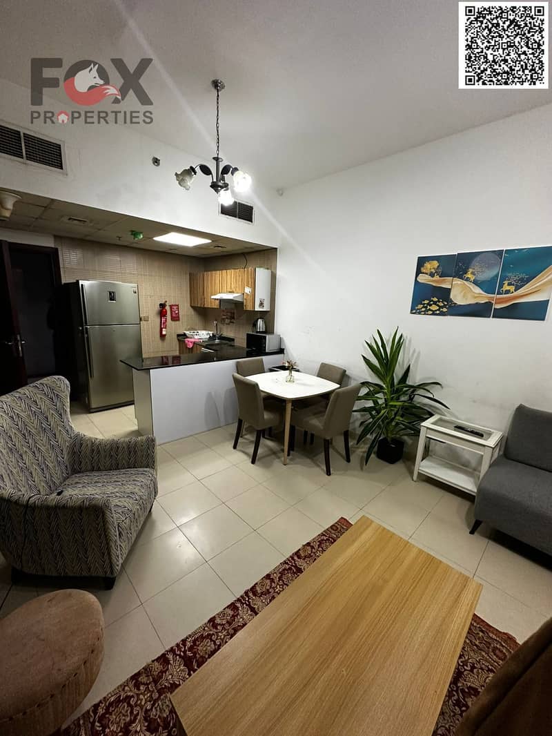 For annual rent in Ajman, a furnished one-bedroom apartment with a living room, balcony, and two bathrooms in City Towers. Prime location close to all