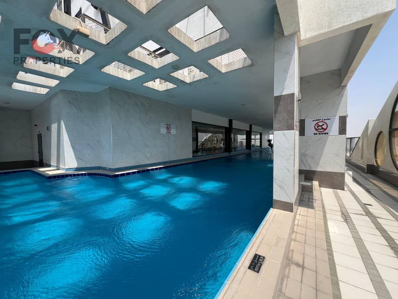 Ultimate luxury 1-bedroom apartment, gym, pool & water park, fully equipped kitchen, 1 month free, built-in wardrobes, prime location.