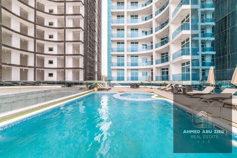 Super Deluxe One Bedroom and Living Room for Rent in Oasis Tower 1, Ajman - Includes Internet, Electricity, and Water - Parking - Gym - Swimming Pool