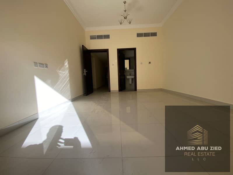 2 master bedroom apartment with living room, 3 bathrooms, balcony with open view, central AC, first tenant, prime location in Al Rawda 1 near Dubai &