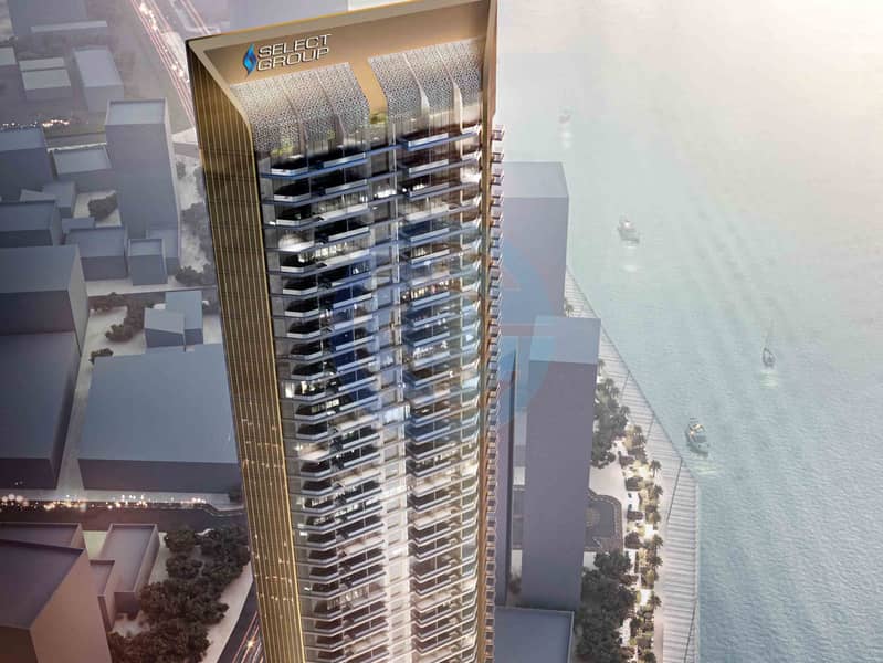 2 6503e67f3ca1f939ee9f796e_DXB MARITIME-SG_TOWER-Aerial_Dusk2-Opt3b (1). jpg