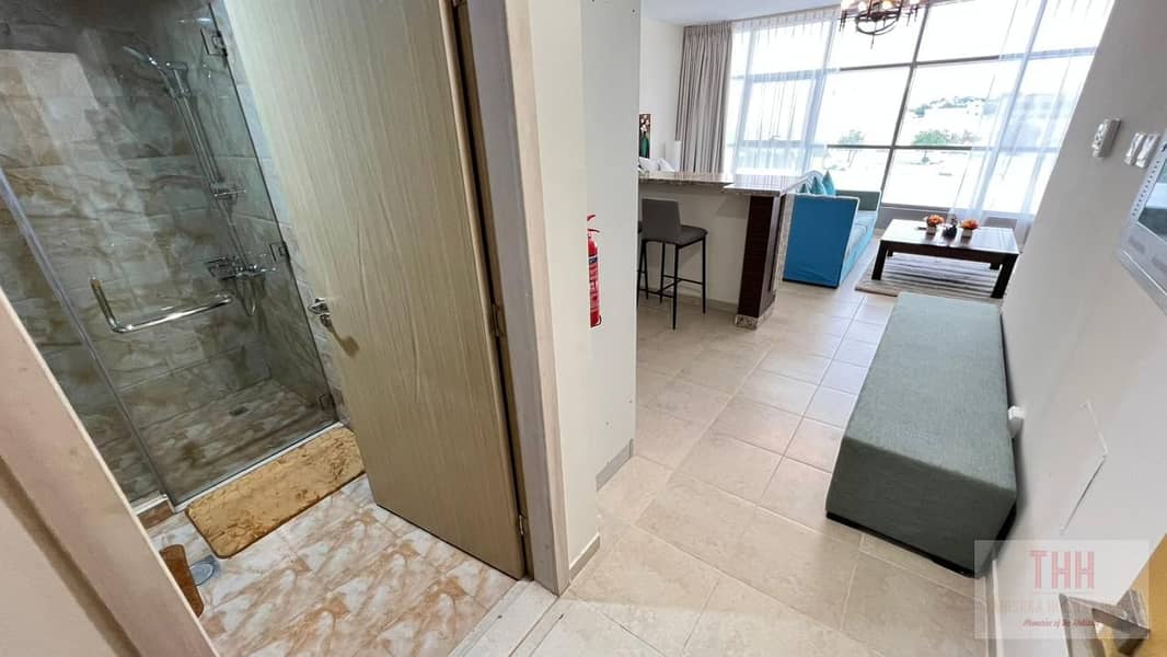 Fully Furnished STUDIO Apartment with All Bills Included and With Covered Parking in Business Park Motor City