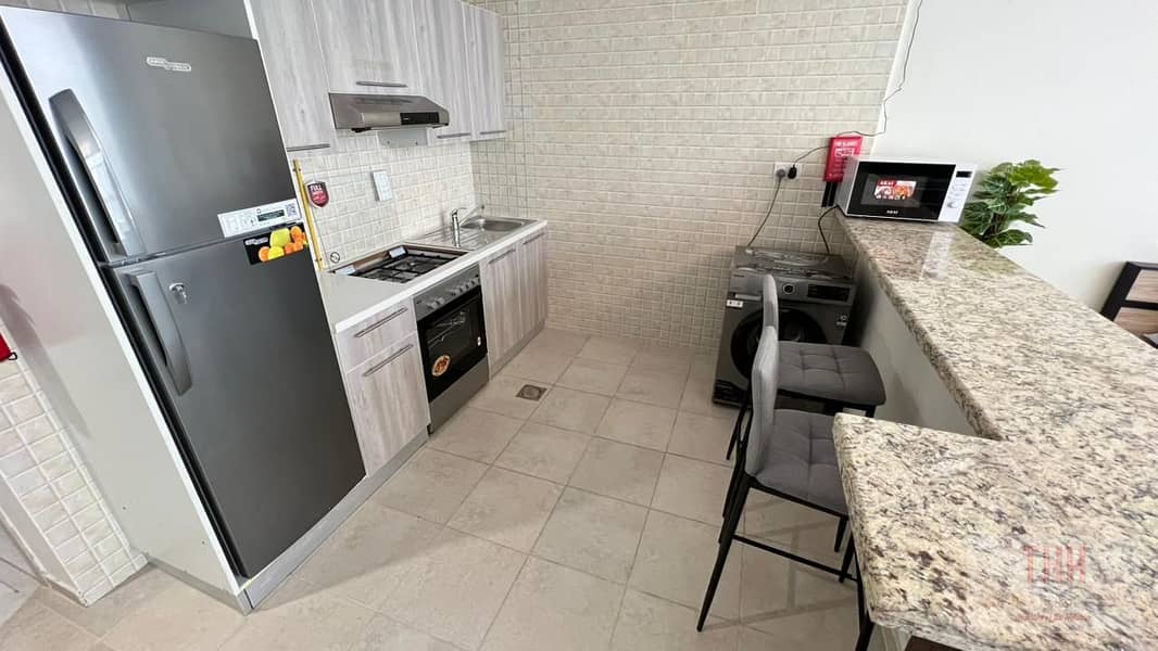 Fully Furnished STUDIO Apartment with All Bills Included and With Covered Parking in Business Park Motor City