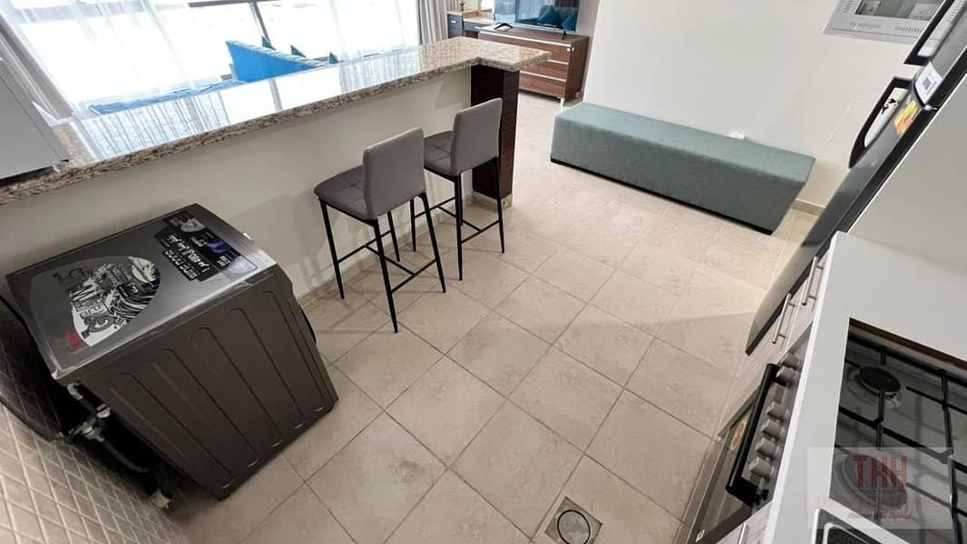 Fully Furnished STUDIO Apartment with All Bills Included and With Covered Parking in Business Park Motor City