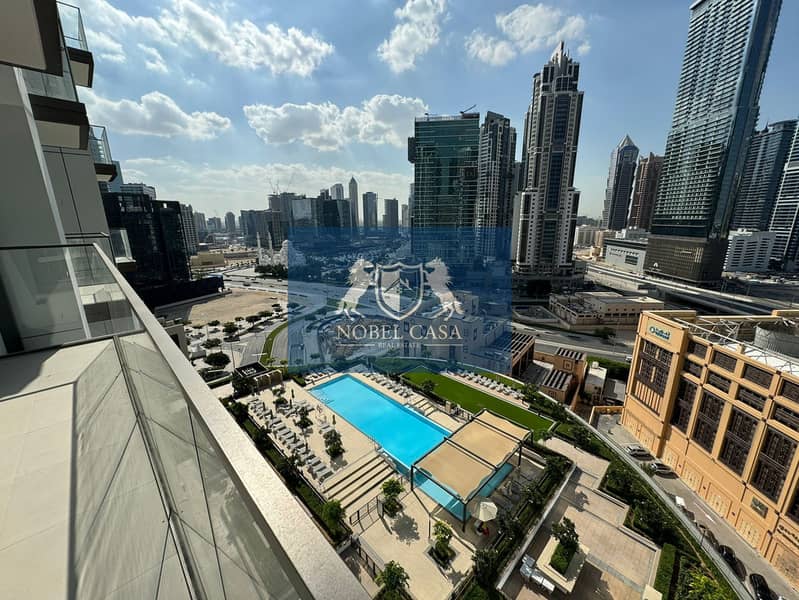 Elegant 2BR Apartment | Prime Downtown Location | Chiller Free