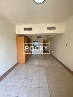 Studio in Karama with balcony | Pool Gym | Behind Ansar Gallery