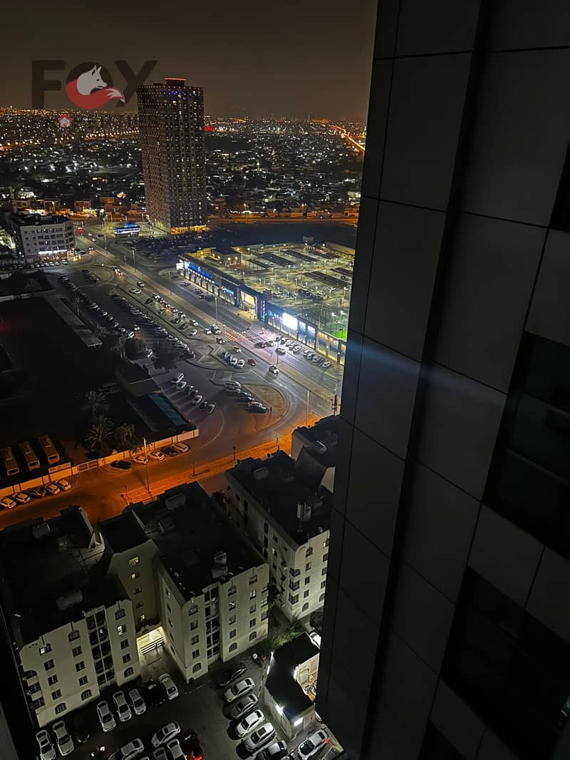 One-bedroom apartment with a living room for annual rent in City Tower Towers in Al Nuaimiya 3 area, fully furnished, parking, balcony, 2 bathrooms,