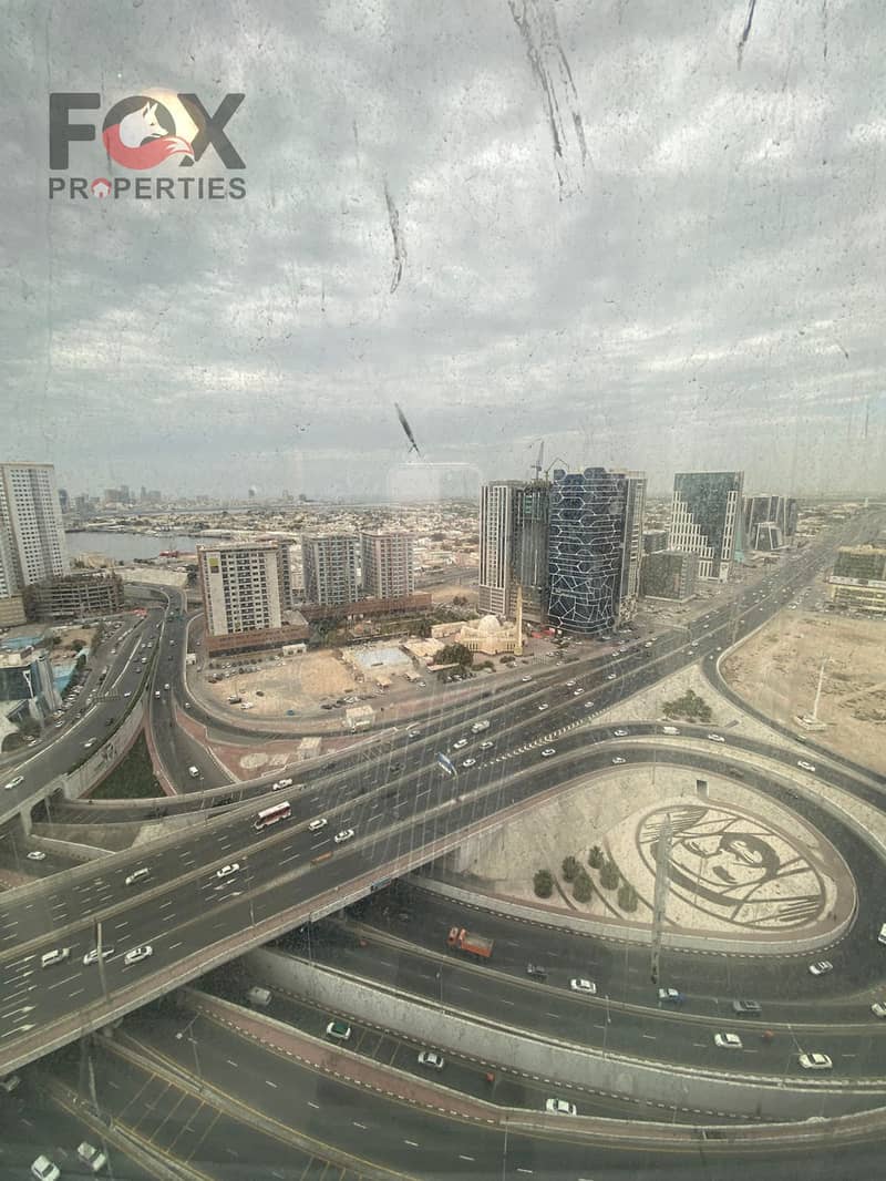 Fully furnished 2-bedroom apartment for annual rent in Concord Towers, 3 bathrooms, balcony, and free parking, AED 60,000 yearly in 4 or 6 installment