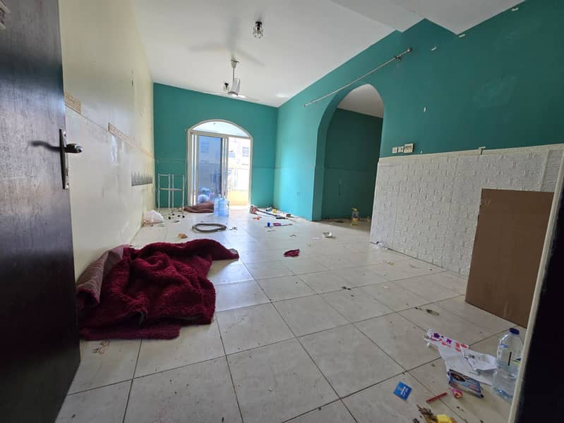 Two-bedroom apartment with a living room for annual rent in Rawda 3 – directly on Sheikh Ammar Street