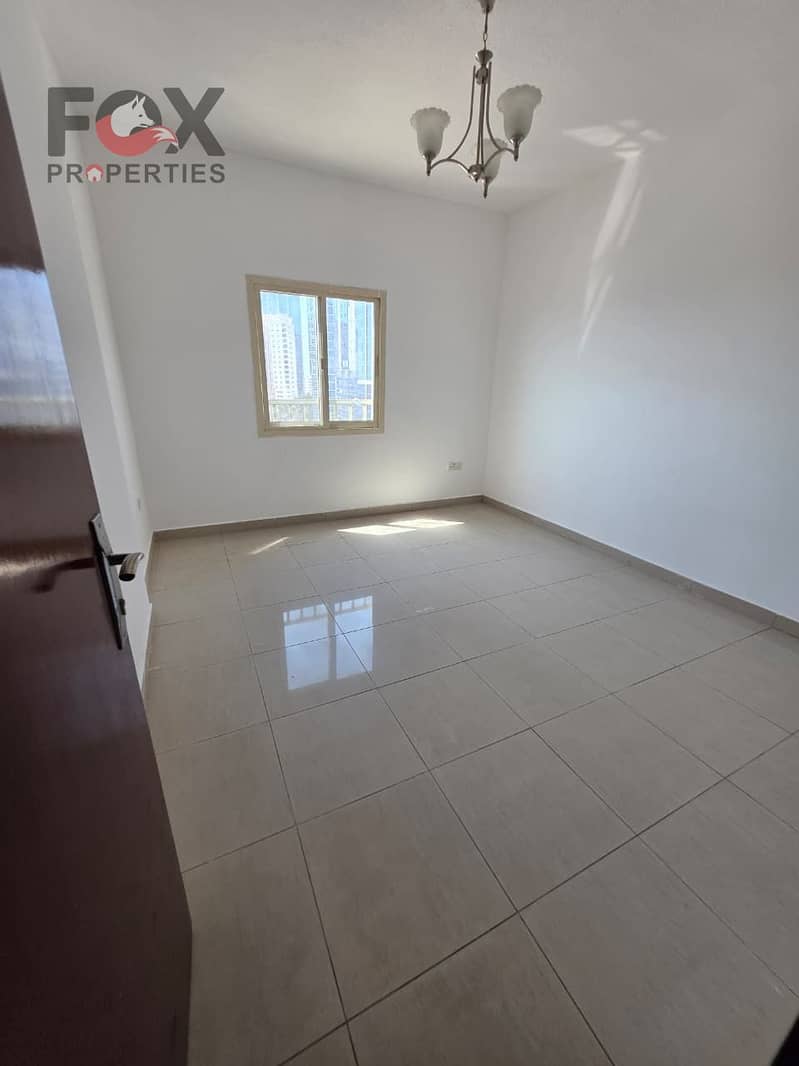 1BR hall yearly in Al Nuaimiya 3 Ajman, free month, 2 baths, balcony, AED 35K, 4 or 6 payments, 1500 cash + 3000 cheque deposit