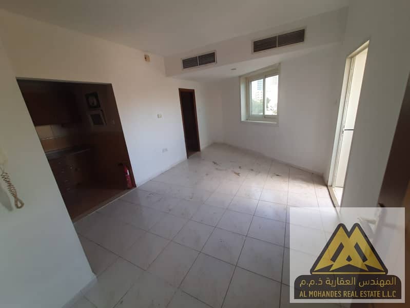 Spacious Studio with Semi-Separate Kitchen, Balcony, Central AC, and Built-In Closets in Al Rashidiya 3, Ajman