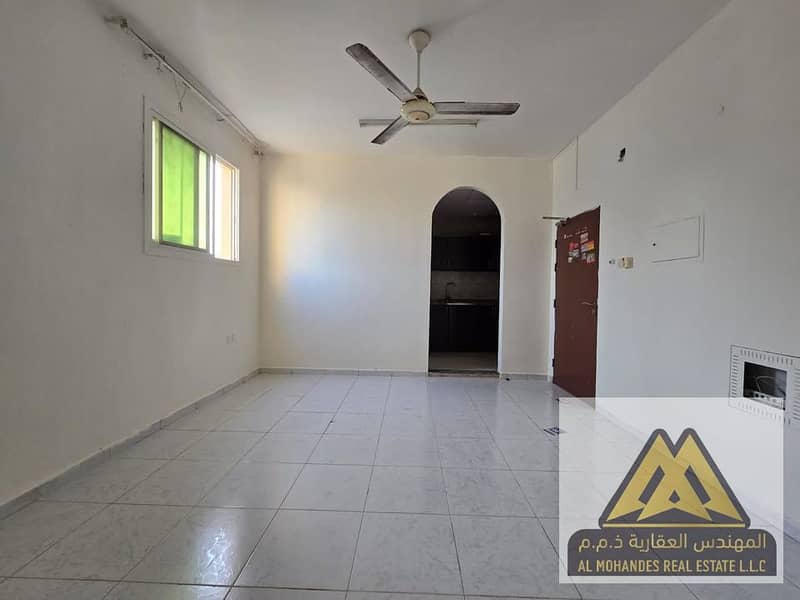 Studio apartment for annual rent in Rawda 2, Ajman. Separate kitchen. Prime location close to all services.