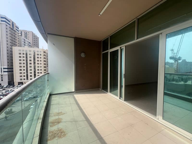 Free AC + parking + gym & pool | 2 master bedrooms, large living room with terrace, built-in wardrobes | Open view, prime Khalid Lake Corniche locatio