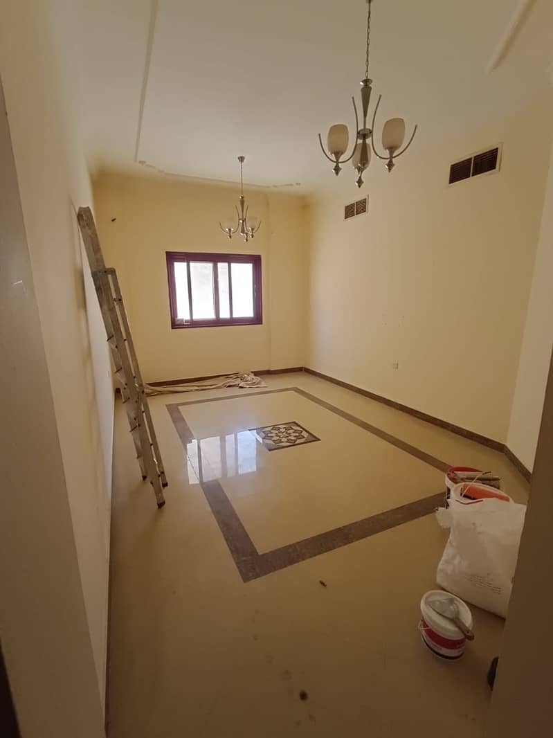 Beautiful 1-bedroom apartment with a living room, excellent space, balcony in the kitchen, and central AC in Al Khan.
