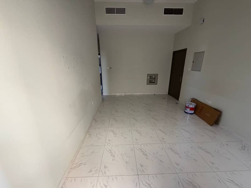 Al Jurf 3: 1BHK Master (2nd Tenant), 2 Baths & Balcony. 32k (4 checks). Central AC & Free Maintenance. Near Chinese Mall & MBZ Road exit. Prime locati