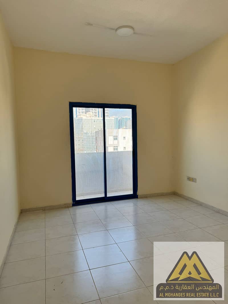 Spacious One-Bedroom Apartment with Living Room, Balcony, Closed Kitchen, and Central AC in Al Naeemia 2 Ajman