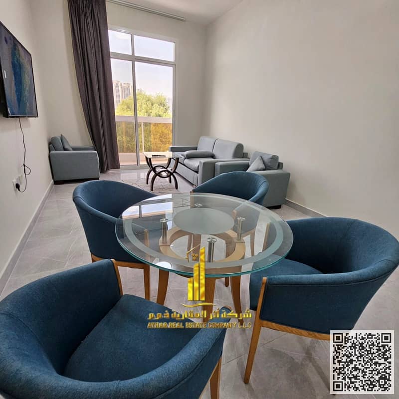 For monthly rent: Luxurious furnished one-bedroom apartment with a living room, in Ajman, Al Rashidiya 2, behind the Ruler's Palace. All bills