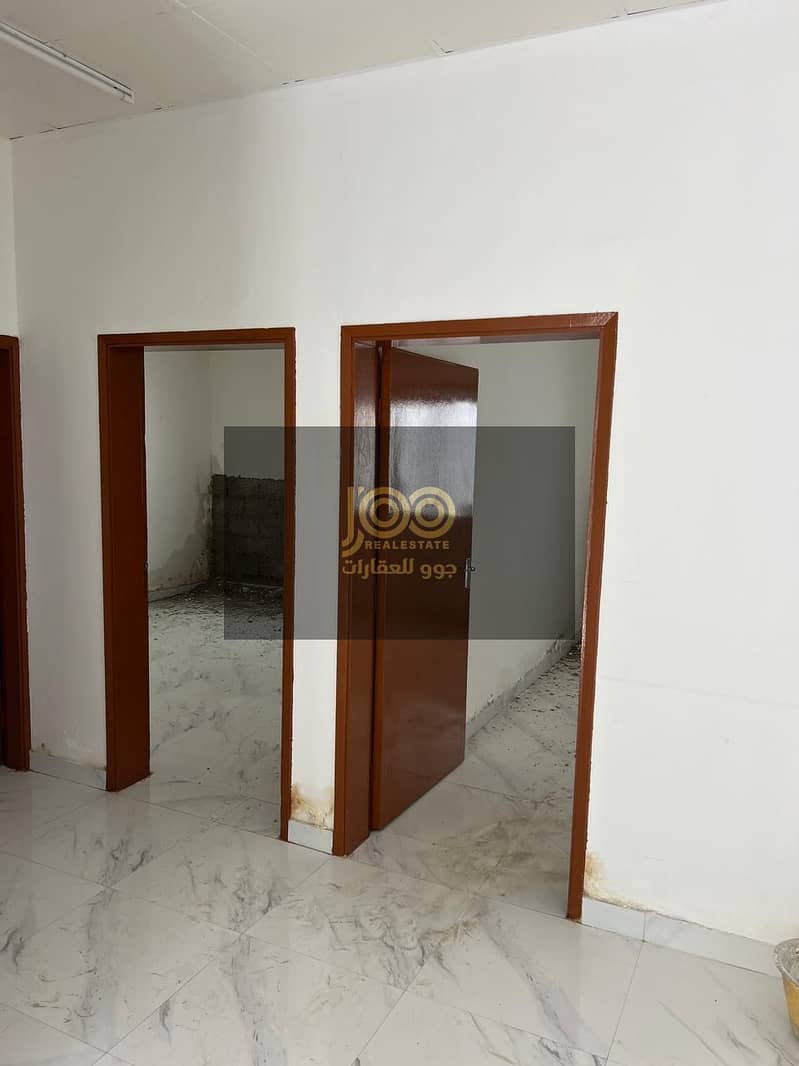 A traditional Arabic house in a quiet location, suitable for family living, and close to essential services.