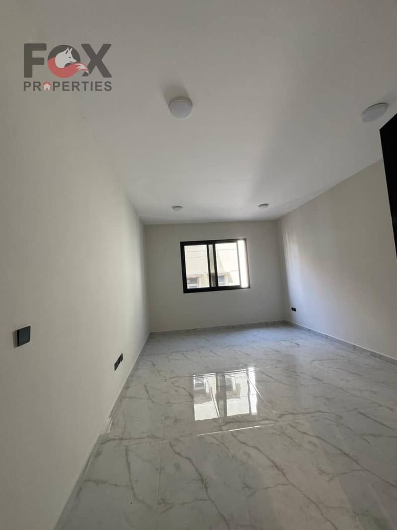Brand new 1BHK for rent in Al Jurf 3, Ajman, spacious with balcony, prime location near services, rent AED 32K, 4 or 6 payments.