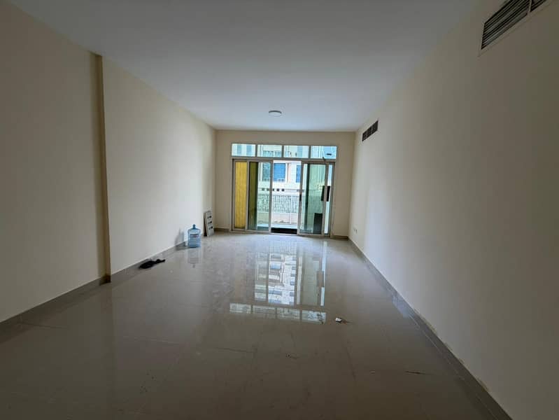 2BR + hall with distrib. , large terrace & balcony in fully renovated building | Prime location near all services & Dubai exit