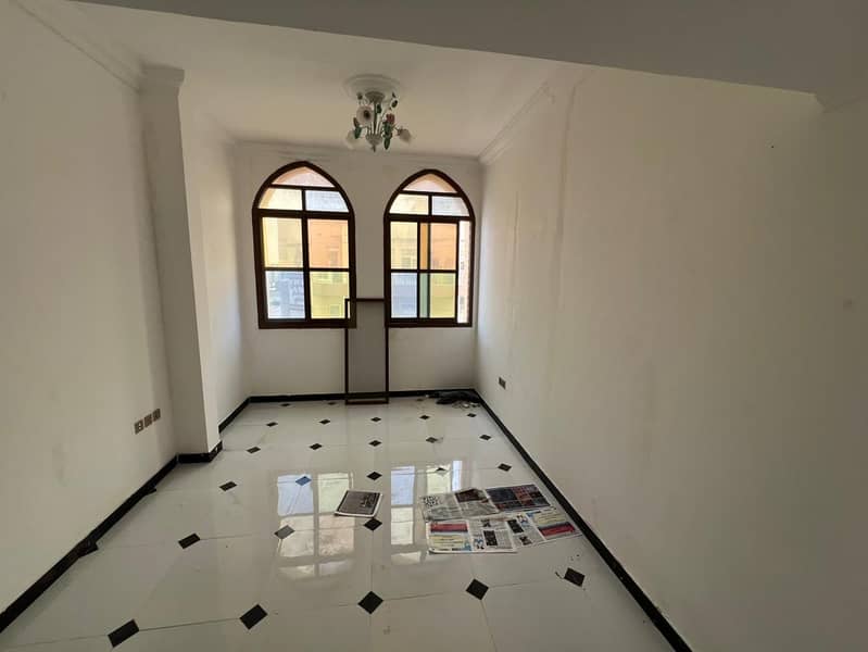 Two-bedroom apartment with a living room in Al Rawdah 3, with a balcony. Spacious. 4 installments.