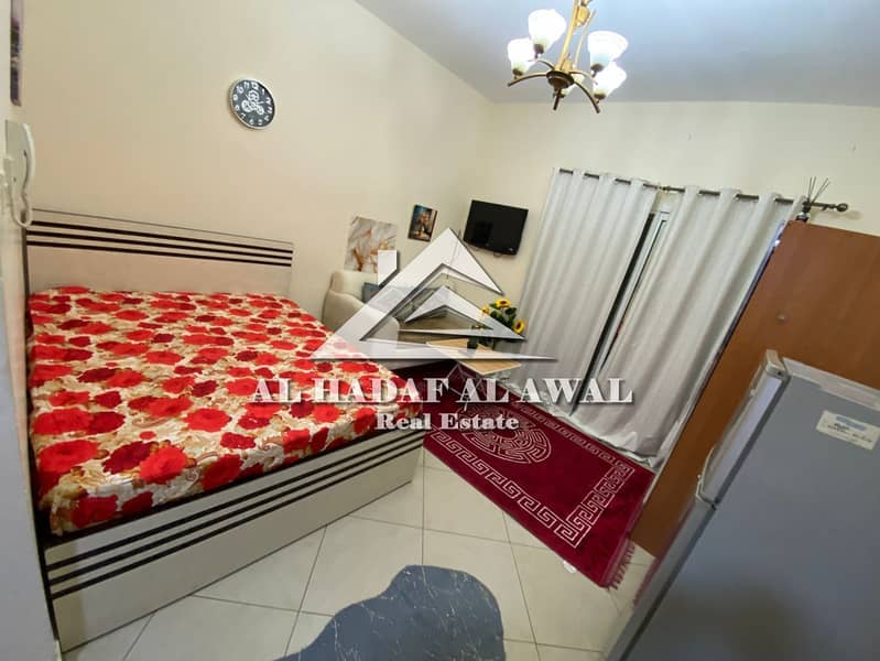 For monthly rent: studio with balcony in Al nhada area with free internet