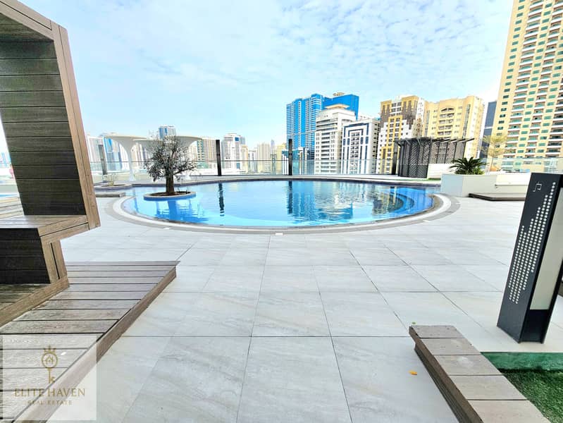 SEAFRONT LUXURIOUS-2BHK PRIME LOCATION GYM POOL BALCONY COVERED PARKING KIDS PLAY AREA