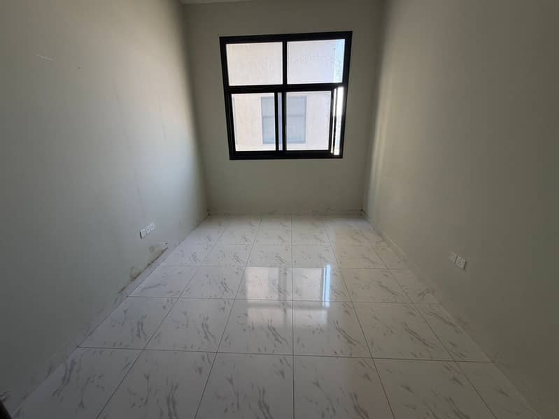 One-bedroom apartment for annual rent in Al Jurf 3 - Ajman, second occupant, 2 bathrooms with master bedroom and balcony, central air conditioning,