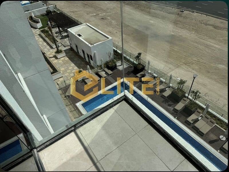 Modern Studio | Azizi Riviera 32 | Balcony | Pool & Road View