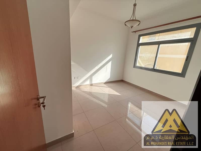 2-bedroom apartment for rent in Al Rashidiya 1, Ajman, spacious, 2 bathrooms, balcony and built-in wardrobes, family building, AED 45,000 yearly in 4