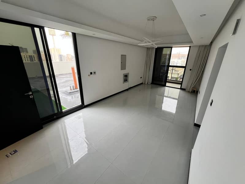 Two-bedroom apartment with a living room - Al Jurf 3, Ajman - near the Chinese market - central air conditioning - suitable for families