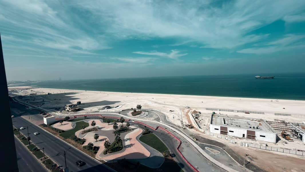 Three bedrooms and a living room, direct view of Ajman Corniche, prime location close to all services