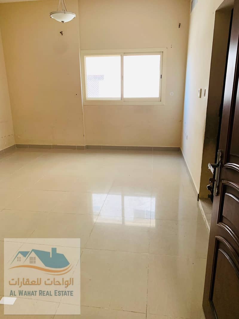 Studio apartment available for annual rent in Al Jurf 3. Features include a separate kitchen, a prime location, flexible payment options (4 or 6 insta